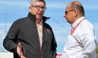 Ross Brawn (GBR) Managing Director, Motor Sports with Luca Colajanni (ITA) Formula One Senior Communications Officer.