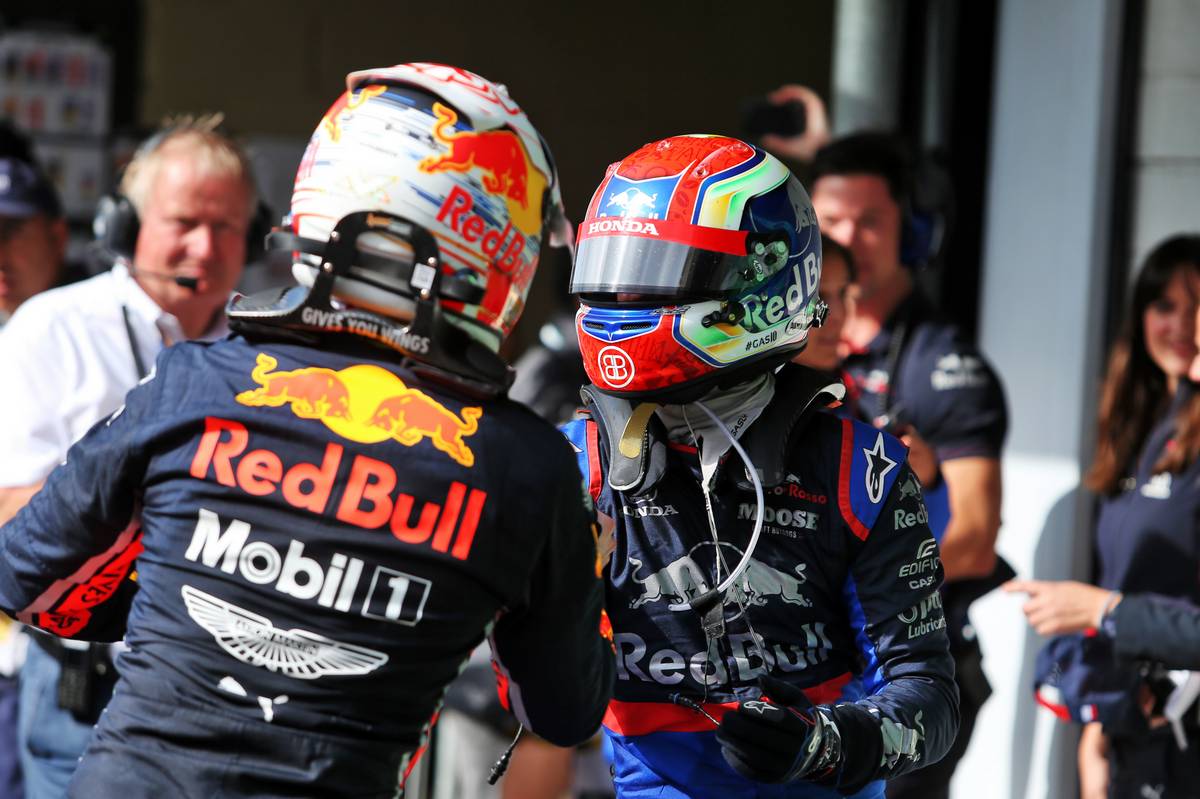 Race winner Max Verstappen (NLD) Red Bull Racing celebrates in parc ferme with second placed Pierre Gasly (FRA) Scuderia Toro Rosso STR14.