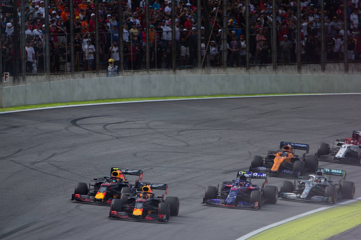 Max Verstappen (NLD) Red Bull Racing RB15 leads under the Safety Car.