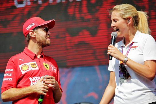 Sebastian Vettel (GER) Ferrari with Rosanna Tennant (GBR) F1 Presenter.
30.11.2019. Formula 1 World Championship, Rd 21, Abu Dhabi Grand Prix, Yas Marina Circuit, Abu Dhabi, Qualifying Day.
 - www.xpbimages.com, EMail: requests@xpbimages.com © Copyright: Bearne / XPB Images