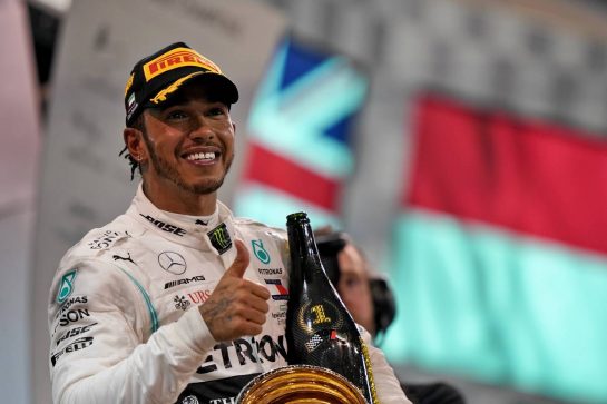Race winner Lewis Hamilton (GBR) Mercedes AMG F1 celebrates on the podium.
01.12.2019. Formula 1 World Championship, Rd 21, Abu Dhabi Grand Prix, Yas Marina Circuit, Abu Dhabi, Race Day.
 - www.xpbimages.com, EMail: requests@xpbimages.com © Copyright: Dungan / XPB Images