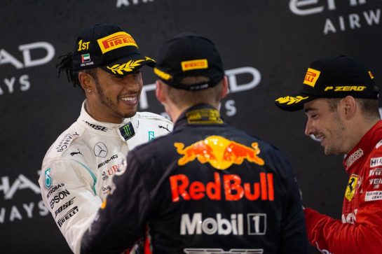 (L to R): Lewis Hamilton (GBR) Mercedes AMG F1, Max Verstappen (NLD) Red Bull Racing, and Charles Leclerc (MON) Ferrari, on the podium.
01.12.2019. Formula 1 World Championship, Rd 21, Abu Dhabi Grand Prix, Yas Marina Circuit, Abu Dhabi, Race Day.
 - www.xpbimages.com, EMail: requests@xpbimages.com © Copyright: Bearne / XPB Images