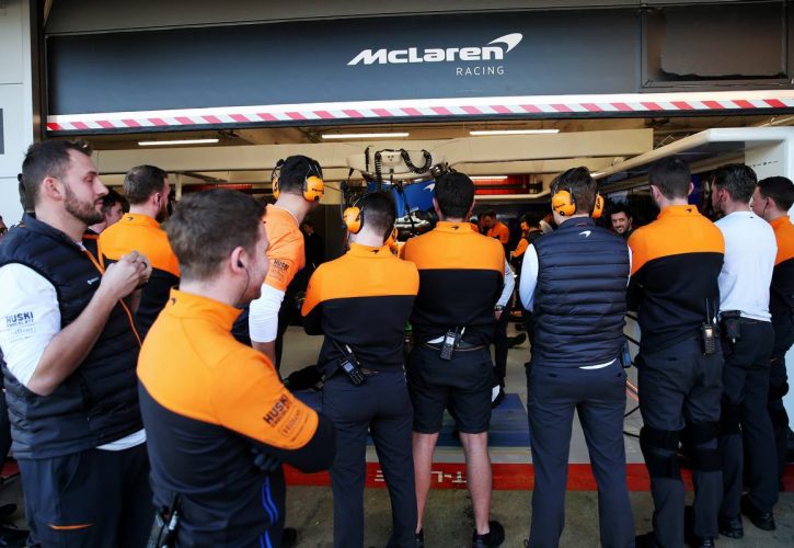 Human wall outside the McLaren pit garage.