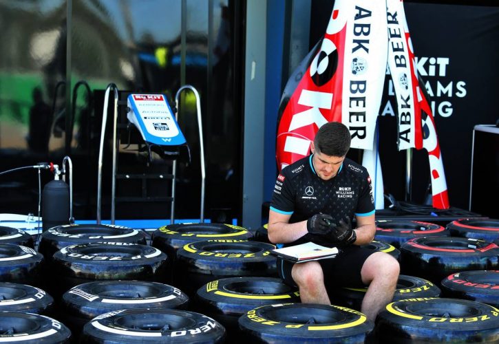Pit atmosphere - Williams Racing mechanic with Pirelli tyres.