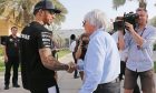Lewis Hamilton (GBR) Mercedes AMG F1 with Bernie Ecclestone (GBR).