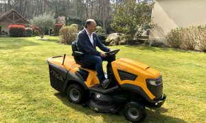 Fred keeps calm and mows the lawn!