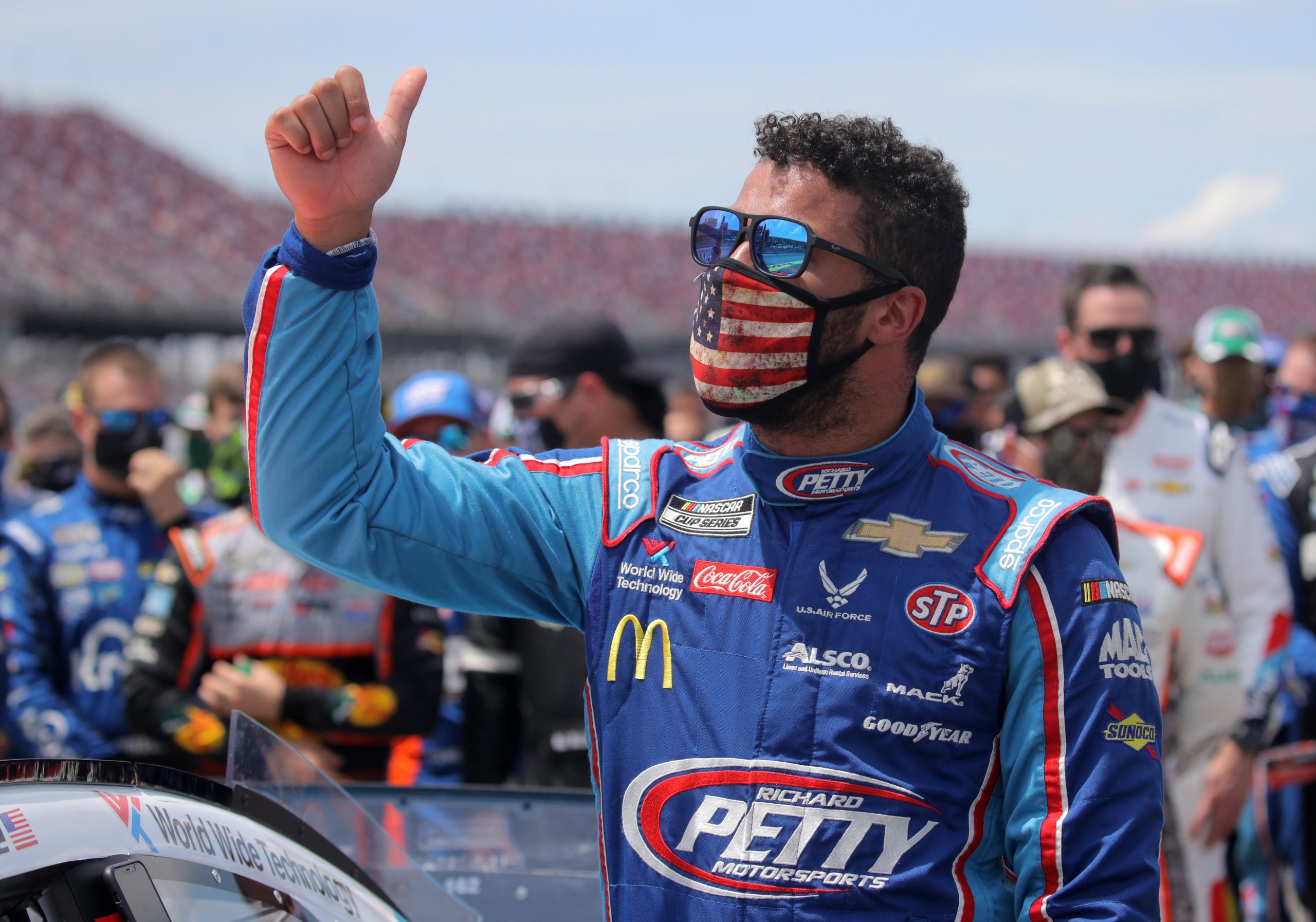 TALLADEGA, ALABAMA - JUNE 22: Bubba Wallace, driver of the #43 Victory Junction Chevrolet, gives a thumbs up prior to the NASCAR Cup Series GEICO 500 at Talladega Superspeedway on June 22, 2020 in Talladega, Alabama. A noose was found in the garage stall of NASCAR driver Bubba Wallace at Talladega Superspeedway a week after the organization banned the Confederate flag at its facilities.