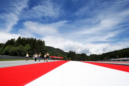 Esteban Ocon (FRA) Renault F1 Team walks the circuit with the team.
02.07.2020. Formula 1 World Championship, Rd 1, Austrian Grand Prix, Spielberg, Austria, Preparation Day.
- www.xpbimages.com, EMail: requests@xpbimages.com © Copyright: Moy / XPB Images