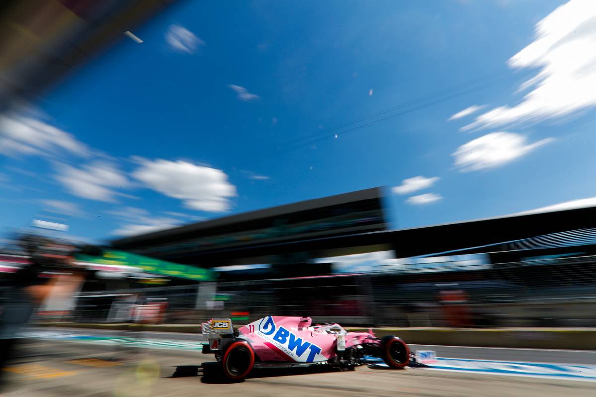 Sergio Perez (MEX) Racing Point F1 Team RP19 leaves the pits.