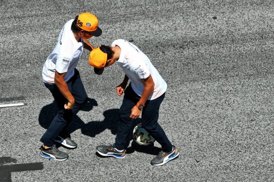 Carlos Sainz Jr (ESP) McLaren and team mate Lando Norris (GBR) McLaren play football on the start / finish straight.
09.07.2020. Formula 1 World Championship, Rd 2, Steiermark Grand Prix, Spielberg, Austria, Preparation Day.
- www.xpbimages.com, EMail: requests@xpbimages.com © Copyright: Batchelor / XPB Images