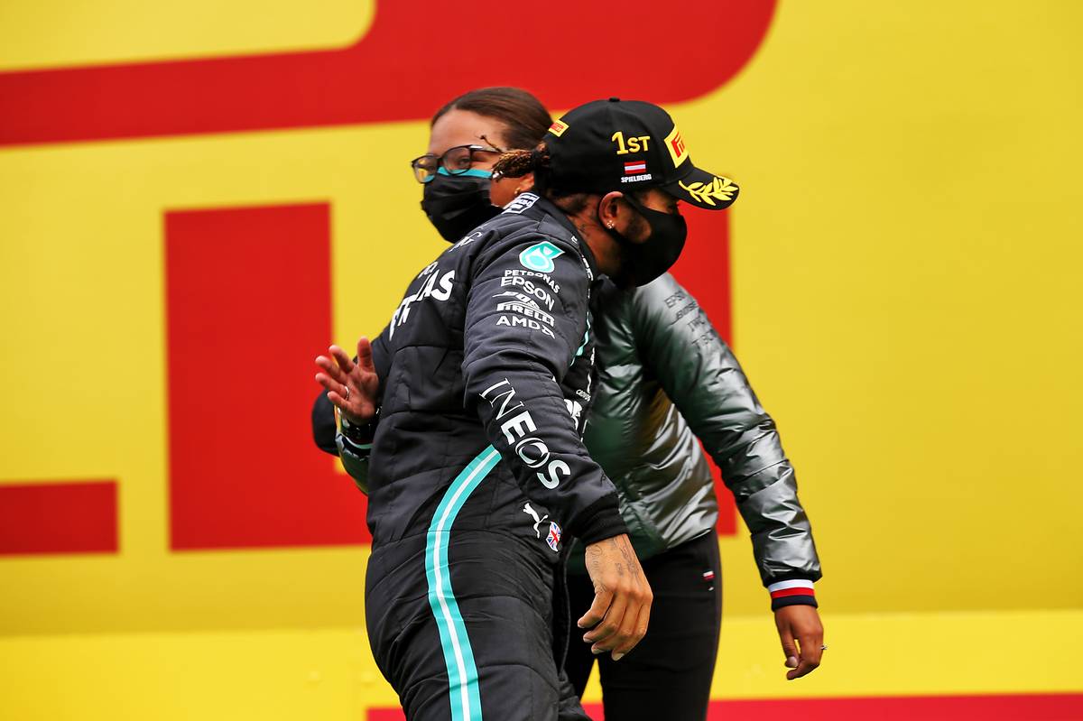 Race winner Lewis Hamilton (GBR) Mercedes AMG F1 celebrates on the podium.