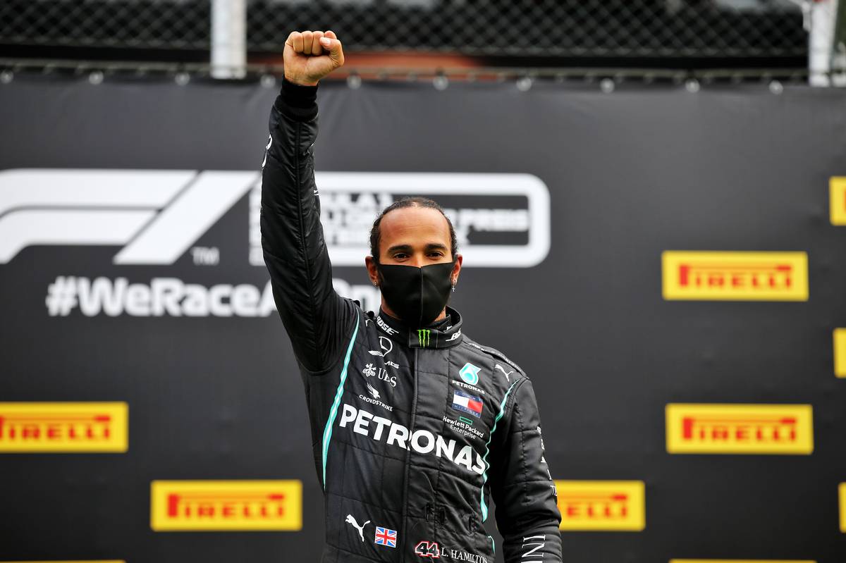 Race winner Lewis Hamilton (GBR) Mercedes AMG F1 celebrates on the podium.
