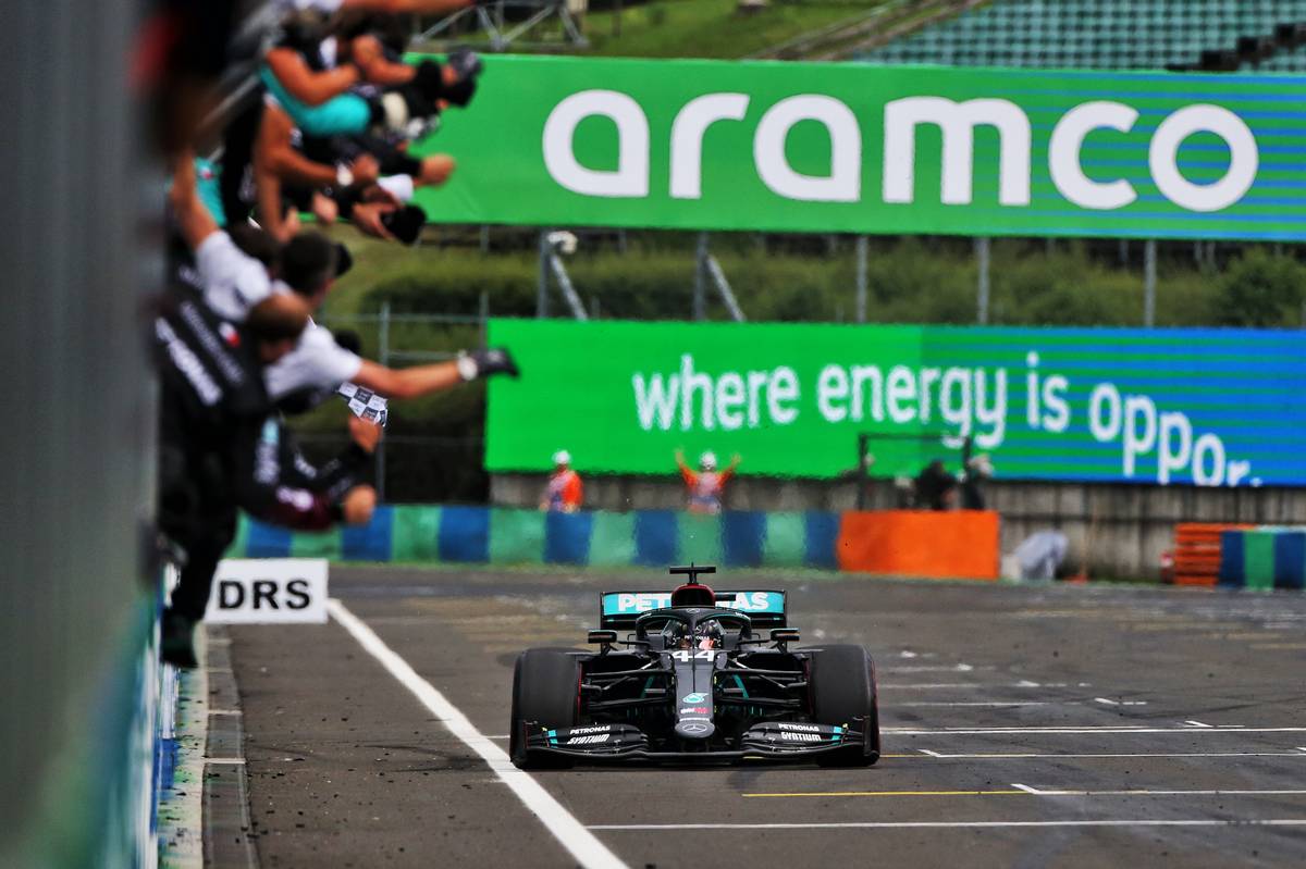 Race winner Lewis Hamilton (GBR) Mercedes AMG F1 W11 passes his team at the end of the race.