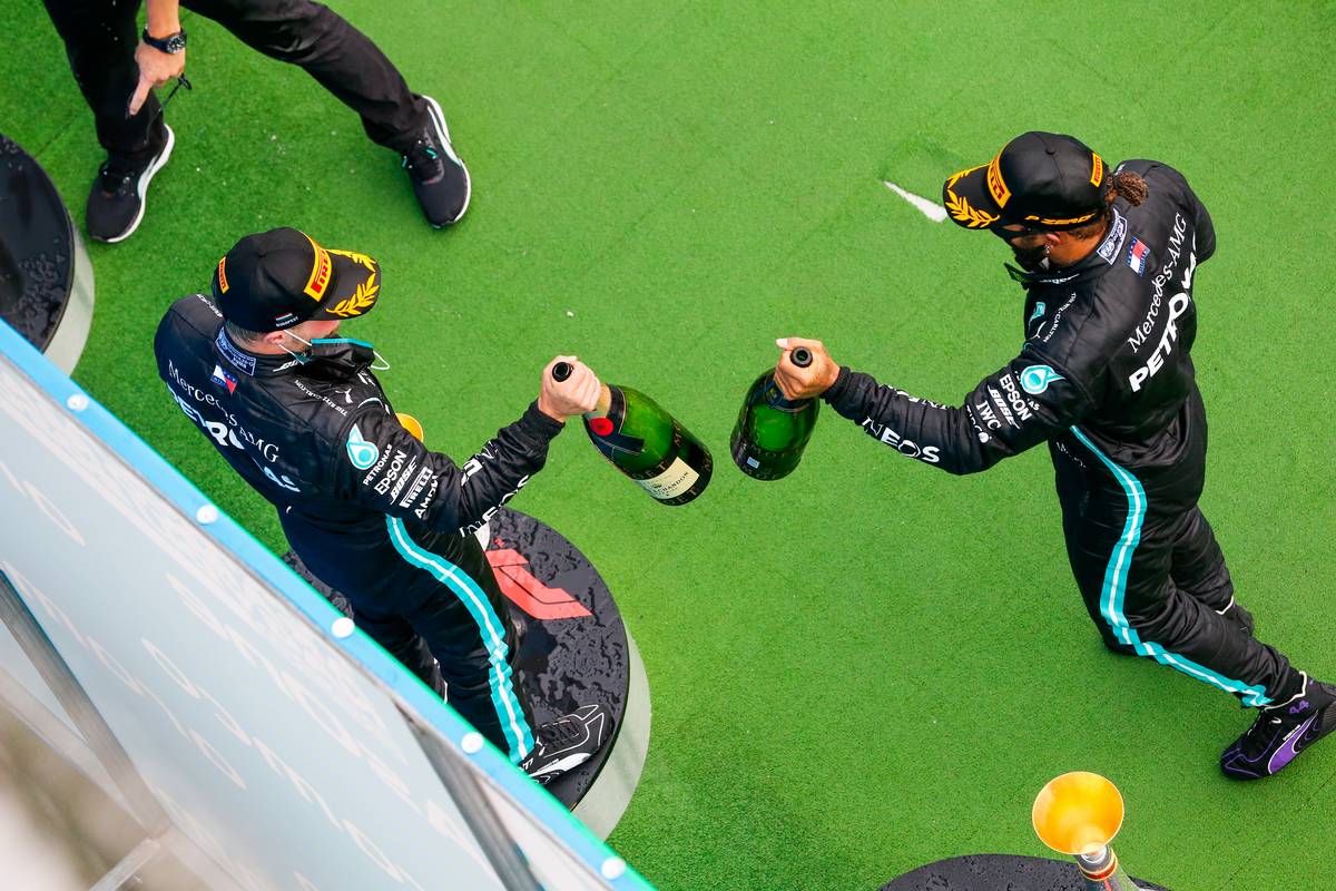 Race winner Lewis Hamilton (GBR) Mercedes AMG F1 (Right) celebrates on the podium with second placed Valtteri Bottas (FIN) Mercedes AMG F1.