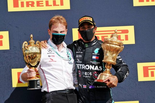 Race winner Lewis Hamilton (GBR) Mercedes AMG F1 celebrates in on the podium with Gilles Pironi (FRA) Mercedes AMG F1.
02.08.2020. Formula 1 World Championship, Rd 4, British Grand Prix, Silverstone, England, Race Day.
- www.xpbimages.com, EMail: requests@xpbimages.com © Copyright: Dungan / XPB Images