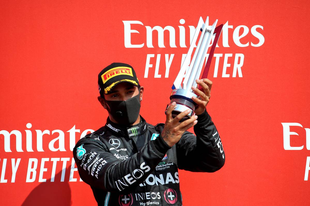Lewis Hamilton (GBR) Mercedes AMG F1 celebrates his second position on the podium.