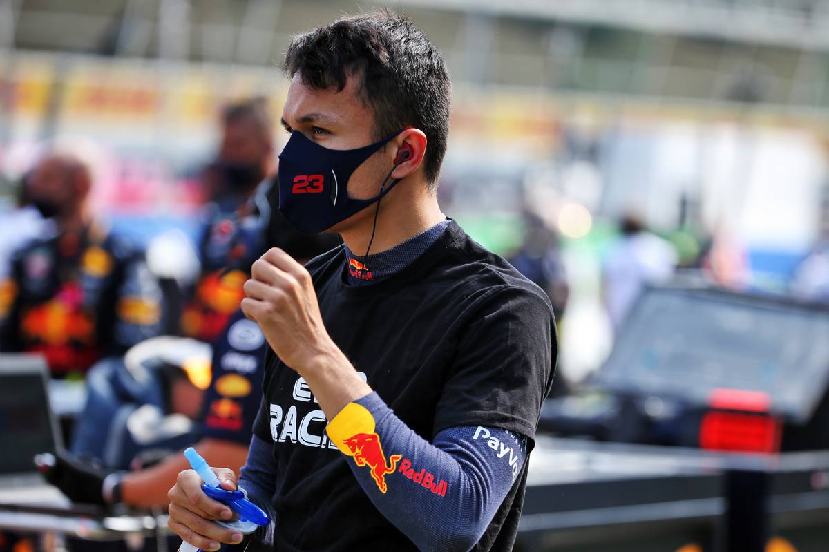 Alexander Albon (THA) Red Bull Racing on the grid.