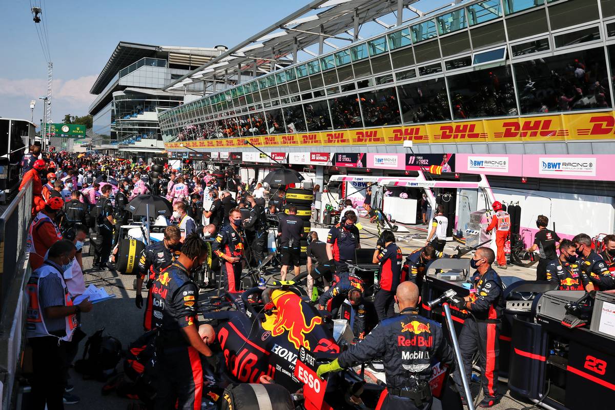 Alexander Albon (THA) Red Bull Racing RB16 in the pits while the race is stopped.
