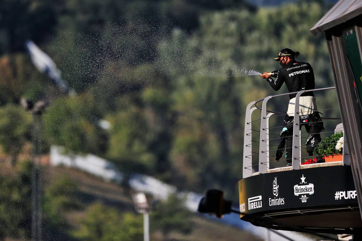 Race winner Lewis Hamilton (GBR) Mercedes AMG F1 celebrates on the podium.