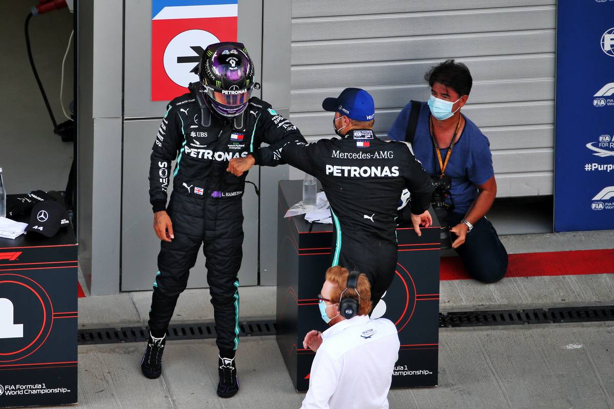 Lewis Hamilton (GBR) Mercedes AMG F1 celebrates his pole position in qualifying parc ferme with third placed team mate Valtteri Bottas (FIN)