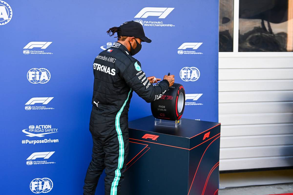 Lewis Hamilton (GBR) Mercedes AMG F1 celebrates his pole position in qualifying parc ferme.