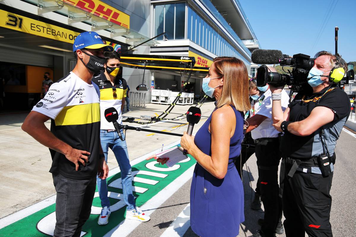 Daniel Ricciardo (AUS) Renault F1 Team and Esteban Ocon (FRA) Renault F1 Team with Natalie Pinkham (GBR) Sky Sports Presenter.