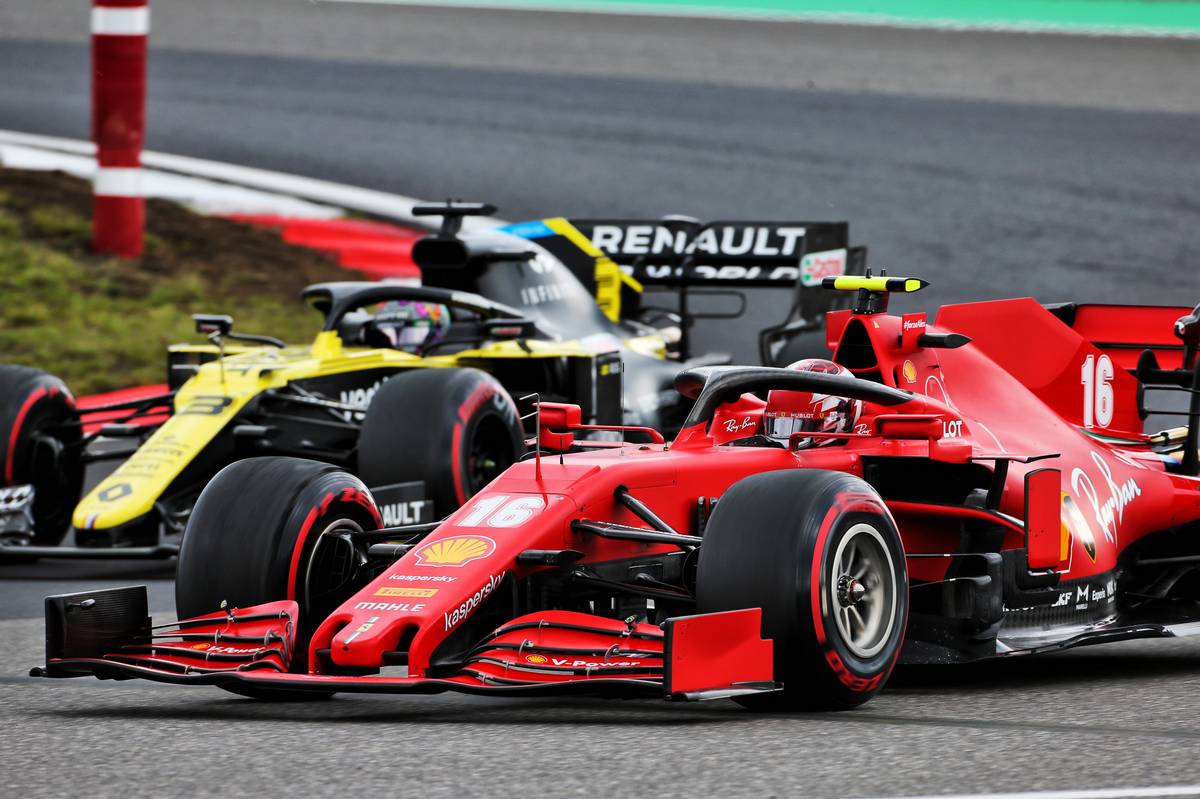 Charles Leclerc (MON) Ferrari SF1000 and Daniel Ricciardo (AUS) Renault F1 Team RS20 battle for position.