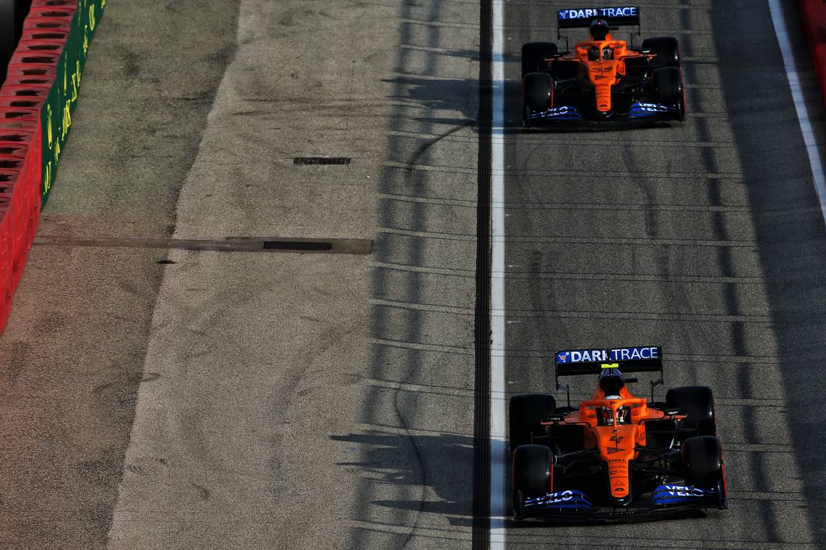 Lando Norris (GBR) McLaren MCL35 and Carlos Sainz Jr (ESP) McLaren MCL35.