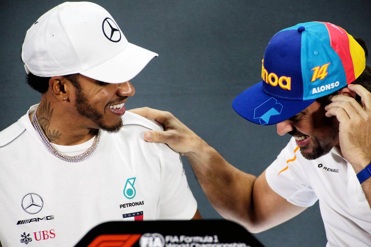 Lewis Hamilton (GBR) Mercedes AMG F1 with Fernando Alonso (ESP) McLaren in the FIA Press Conference.