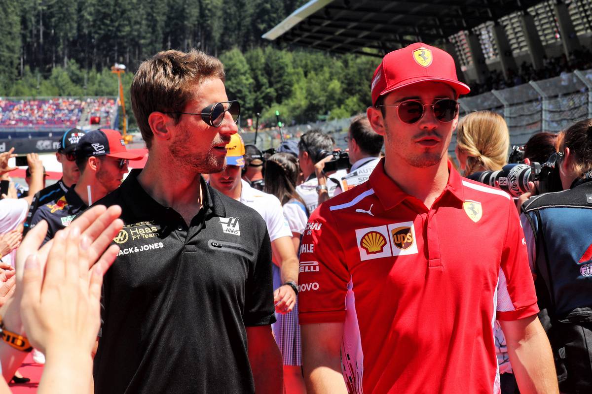 Romain Grosjean (FRA) Haas F1 Team and Charles Leclerc (MON) Ferrari on the drivers parade.