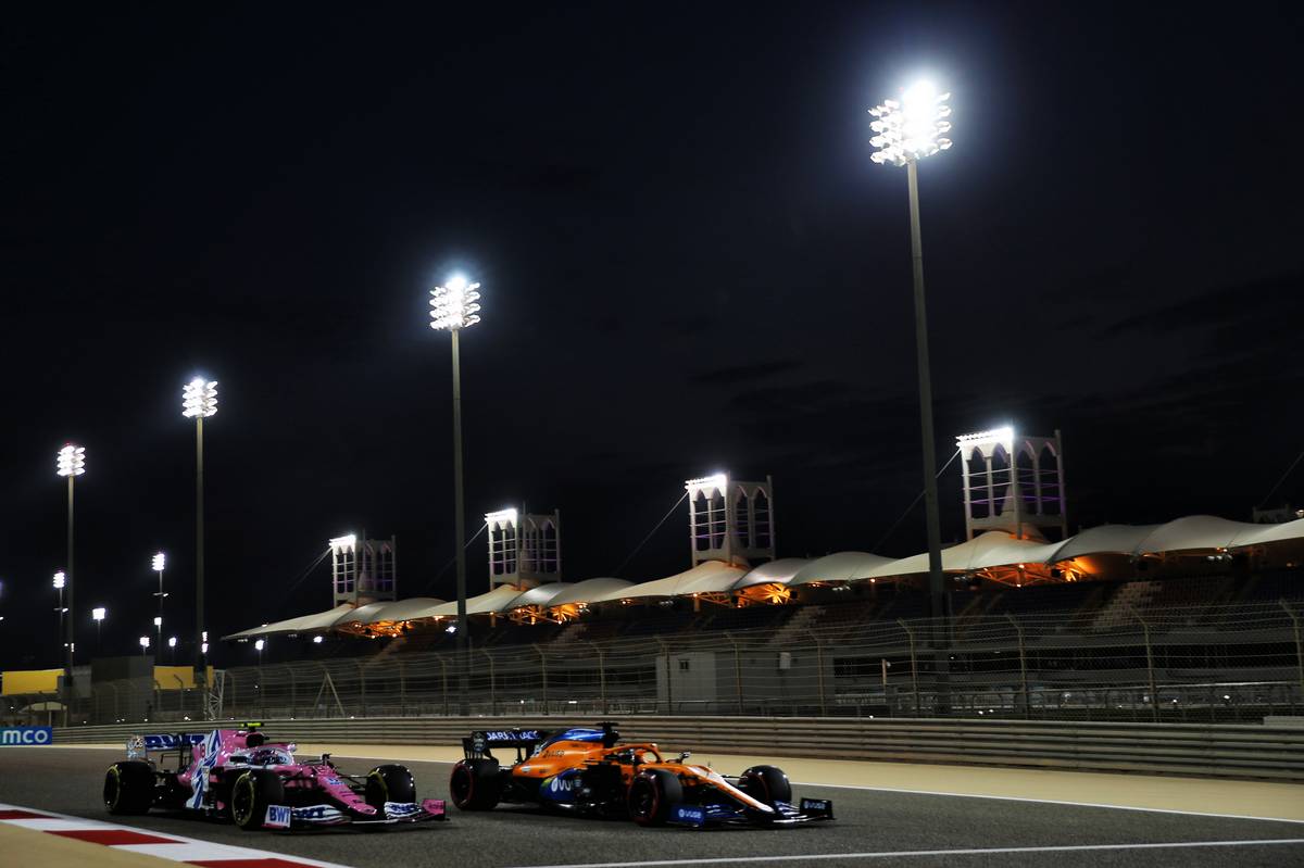 Carlos Sainz Jr (ESP) McLaren MCL35 and Lance Stroll (CDN) Racing Point F1 Team RP20. 28.11.2020. Formula 1 World Championship, Rd 15, Bahrain Grand Prix