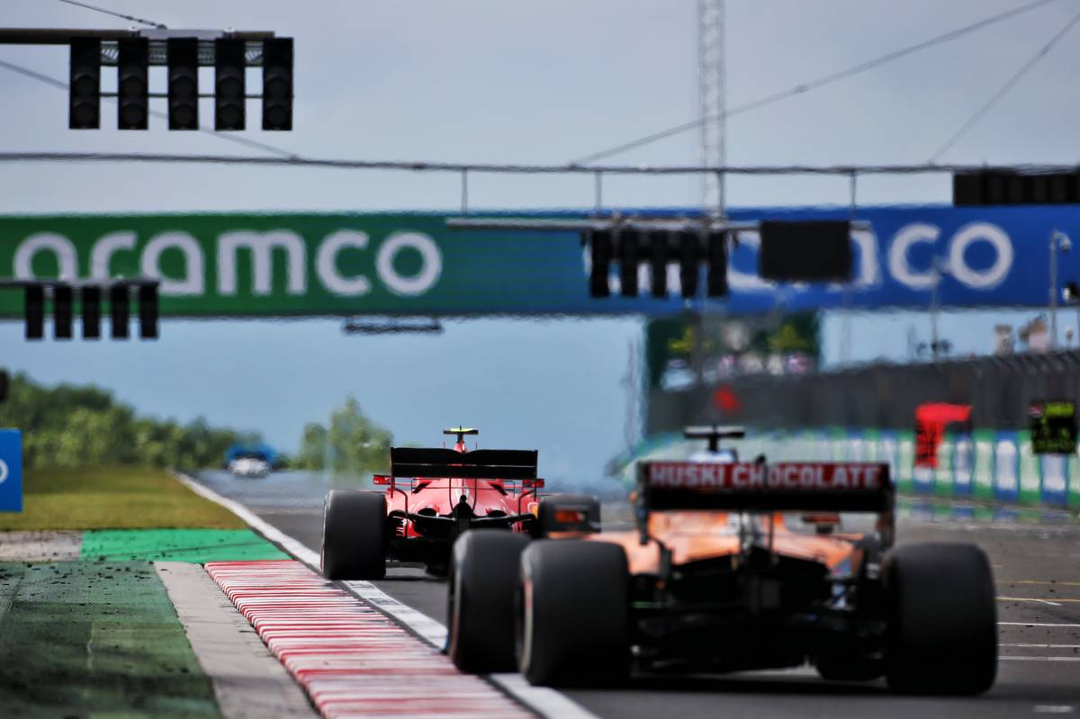 Charles Leclerc (MON) Ferrari SF1000 leads Carlos Sainz Jr (ESP) McLaren MCL35.