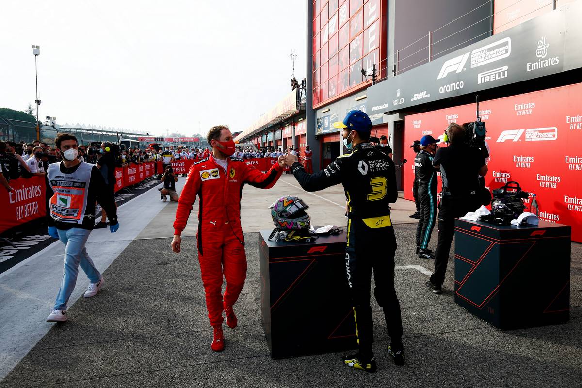 Sebastian Vettel (GER) Ferrari congratulates third placed Daniel Ricciardo (AUS) Renault F1 Team in parc ferme.