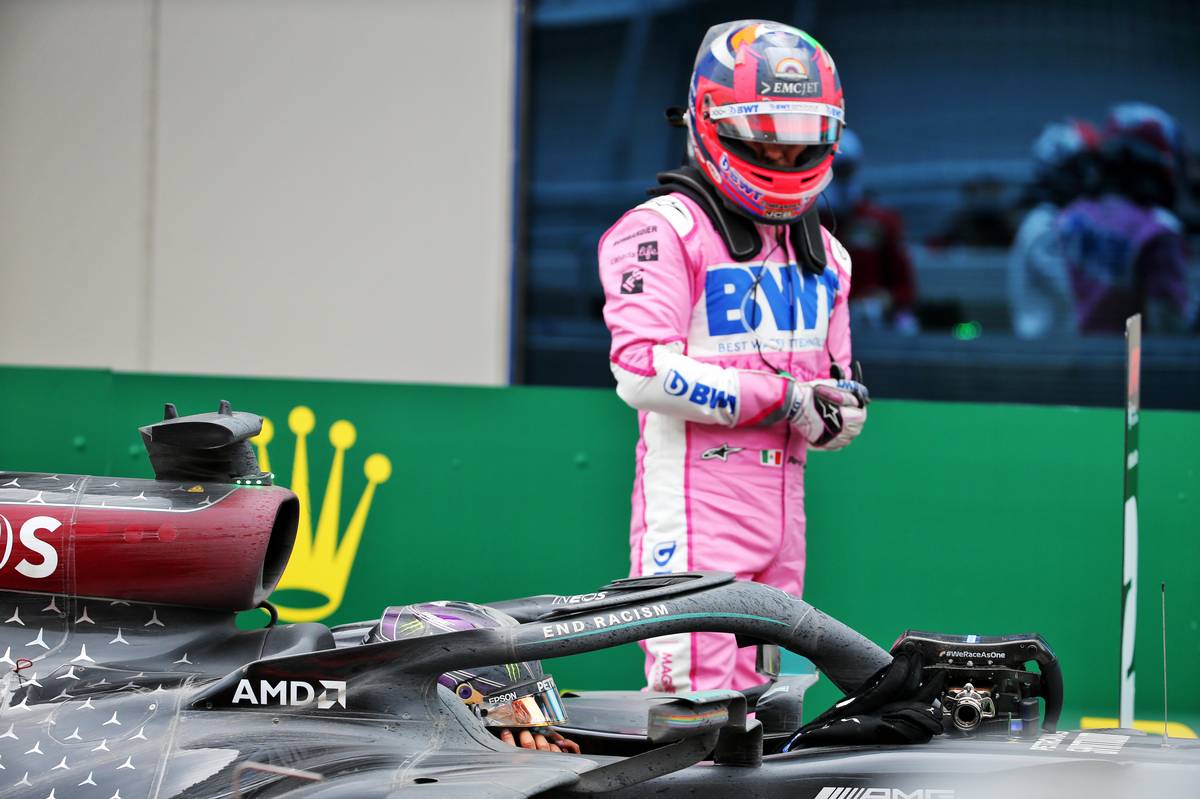 Sergio Perez (MEX) Racing Point F1 Team in parc ferme with Lewis Hamilton (GBR) Mercedes AMG F1 W11.