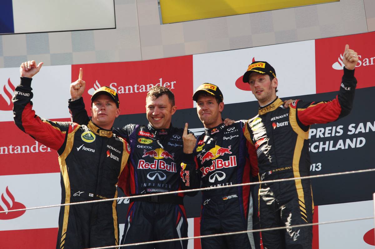 The podium (L to R): Kimi Raikkonen (FIN) Lotus F1 Team, second; Sebastian Vettel (GER) Red Bull Racing, race winner; Romain Grosjean (FRA) Lotus F1 Team, third.. 07.07.2013.