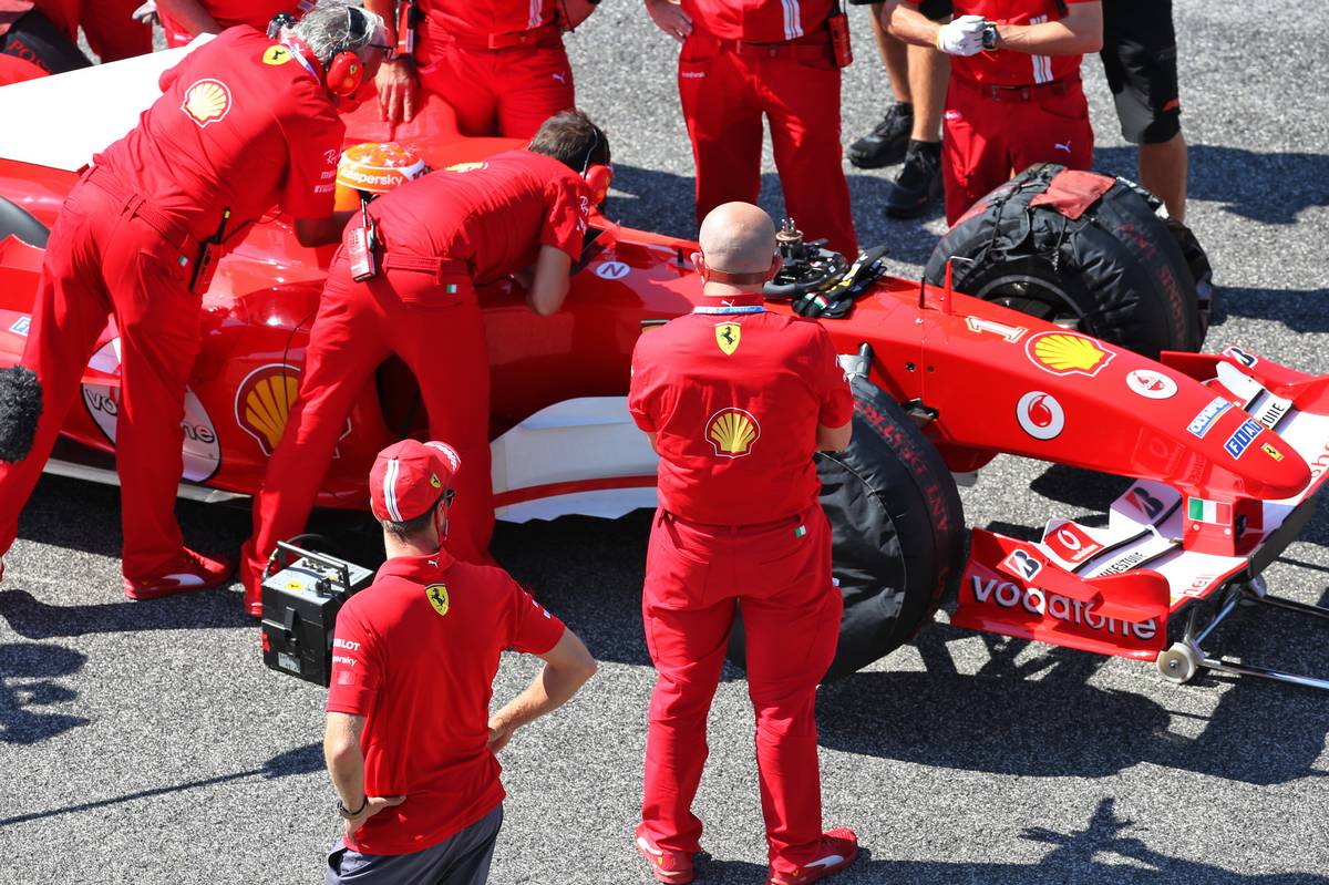 Sebastian Vettel (GER) Ferrari watches Mick Schumacher (GER) Prema Racing Formula 2 Driver in the Ferrari F2004. 13.09.2020