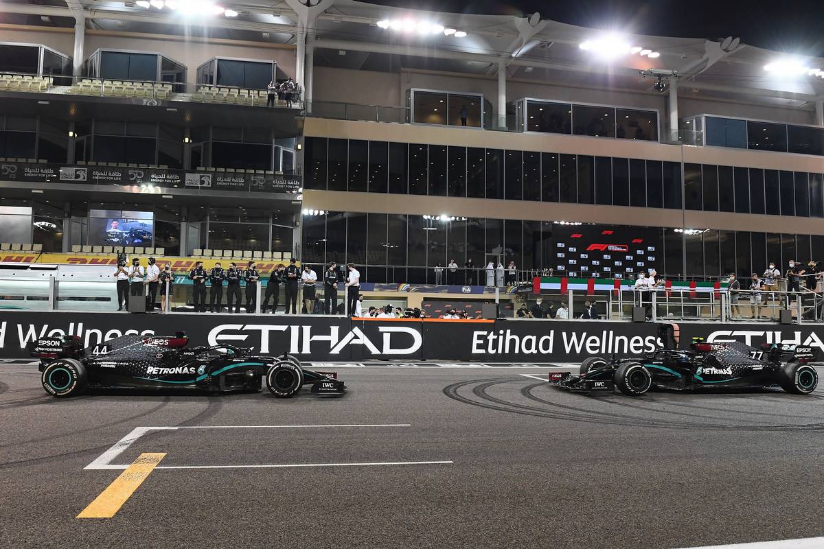 Lewis Hamilton (GBR) Mercedes AMG F1 W11 and Valtteri Bottas (FIN) Mercedes AMG F1 W11 at the end of the race. 13.12.2020. Formula 1 World Championship, Rd 17, Abu Dhabi Grand Prix