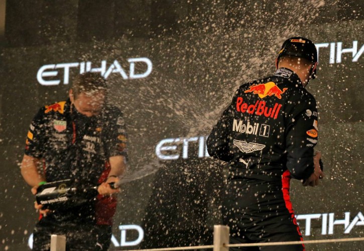 Race winner Max Verstappen (NLD) Red Bull Racing celebrates on the podium with Paul Monaghan (GBR) Red Bull Racing Chief Engineer. 13.12.2020. Formula 1 World Championship, Rd 17, Abu Dhabi Grand Prix