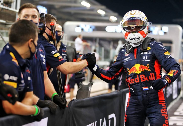 Max Verstappen (NLD) Red Bull Racing celebrates his pole position in qualifying parc ferme with the team. 12.12.2020. Formula 1 World Championship, Rd 17, Abu Dhabi Grand Prix