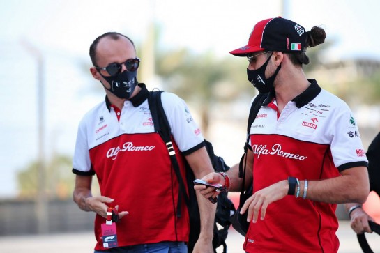 Antonio Giovinazzi (ITA) Alfa Romeo Racing with Robert Kubica (POL) Alfa Romeo Racing Reserve Driver.
04.12.2020. Formula 1 World Championship, Rd 16, Sakhir Grand Prix, Sakhir, Bahrain, Practice Day
- www.xpbimages.com, EMail: requests@xpbimages.com © Copyright: Batchelor / XPB Images