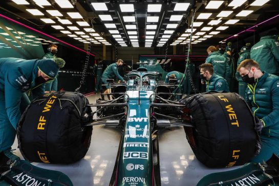 Lance Stroll, Aston Martin AMR21, in the garage