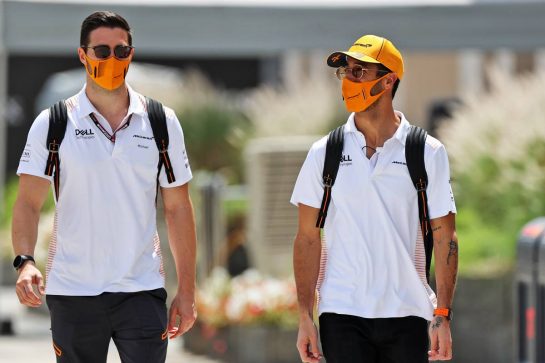 Daniel Ricciardo (AUS) McLaren with Michael Italiano (AUS) McLaren Performance Coach.
26.03.2021. Formula 1 World Championship, Rd 1, Bahrain Grand Prix, Sakhir, Bahrain, Practice Day
- www.xpbimages.com, EMail: requests@xpbimages.com © Copyright: Moy / XPB Images