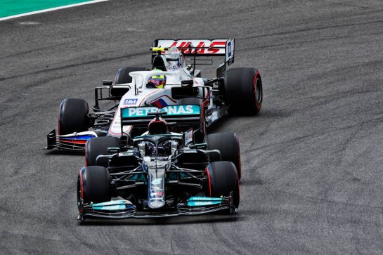 Lewis Hamilton (GBR) Mercedes AMG F1 W12 leads Mick Schumacher (GER) Haas VF-21.
30.04.2021. Formula 1 World Championship, Rd 3, Portuguese Grand Prix, Portimao, Portugal, Practice Day.
 - www.xpbimages.com, EMail: requests@xpbimages.com © Copyright: Staley / XPB Images