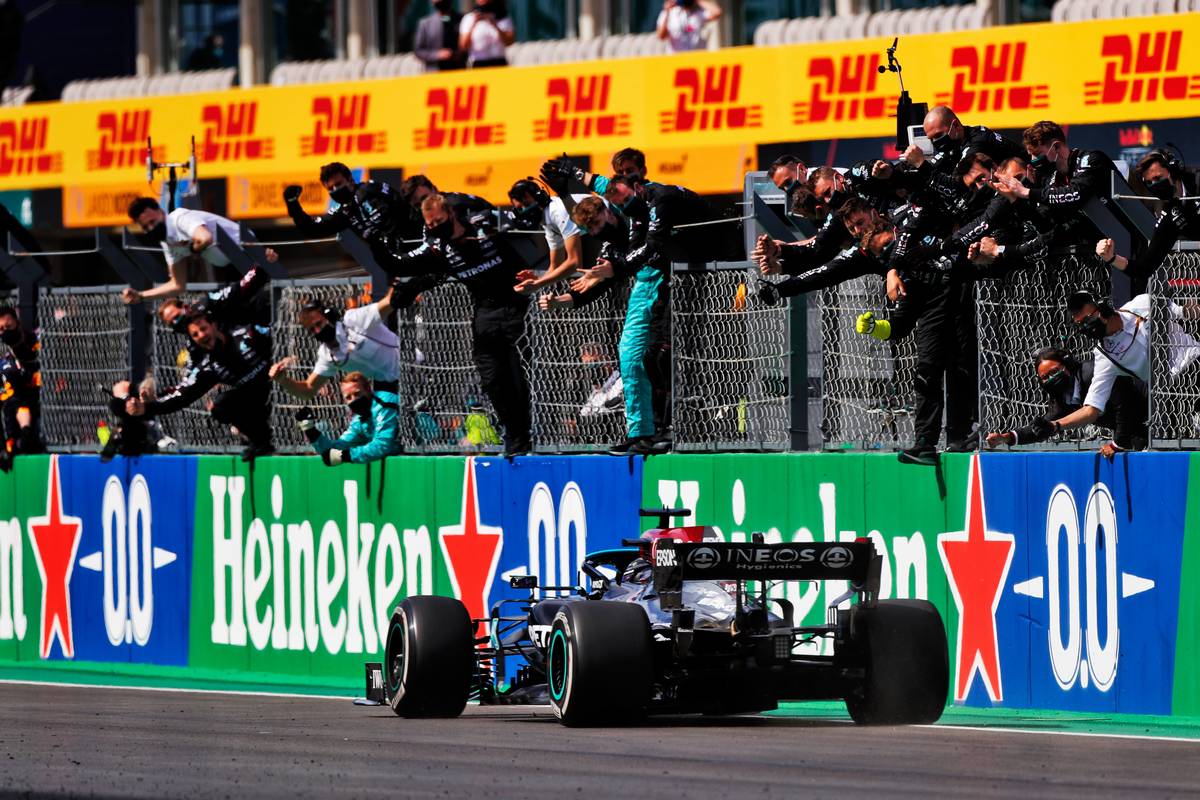 Race winner Lewis Hamilton (GBR) Mercedes AMG F1 W12 celebrates with the team at the end of the race. 02.05.2021. Formula 1 World Championship, Rd 3, Portuguese Grand Prix, Portimao