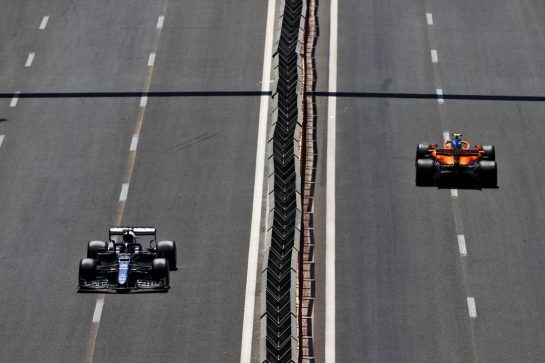 Yuki Tsunoda (JPN) AlphaTauri AT02 and Lando Norris (GBR) McLaren MCL35M.
05.06.2021. Formula 1 World Championship, Rd 6, Azerbaijan Grand Prix, Baku Street Circuit, Azerbaijan, Qualifying Day.
- www.xpbimages.com, EMail: requests@xpbimages.com © Copyright: Moy / XPB Images