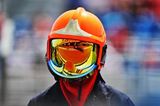 Fernando Alonso (ESP) Alpine F1 Team A521 reflected in a fire marshal's helmet visor.
18.06.2021. Formula 1 World Championship, Rd 7, French Grand Prix, Paul Ricard, France, Practice Day.
- www.xpbimages.com, EMail: requests@xpbimages.com © Copyright: Moy / XPB Images