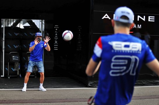 Fernando Alonso (ESP) Alpine F1 Team plays football in the paddock with team mate Esteban Ocon (FRA) Alpine F1 Team.
24.06.2021. Formula 1 World Championship, Rd 8, Steiermark Grand Prix, Spielberg, Austria, Preparation Day.
- www.xpbimages.com, EMail: requests@xpbimages.com © Copyright: Moy / XPB Images