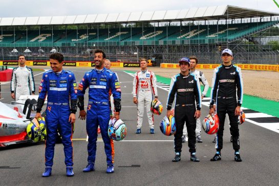 (L to R): Lando Norris (GBR) McLaren and Daniel Ricciardo (AUS) McLaren; Fernando Alonso (ESP) Alpine F1 Team and Esteban Ocon (FRA) Alpine F1 Team - 2022 Car Launch.
15.07.2021. Formula 1 World Championship, Rd 10, British Grand Prix, Silverstone, England, Preparation Day.
- www.xpbimages.com, EMail: requests@xpbimages.com © Copyright: Davenport / XPB Images