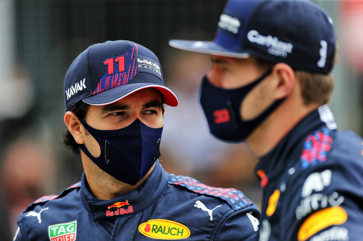 Sergio Perez (MEX) Red Bull Racing and team mate Max Verstappen (NLD) Red Bull Racing - 2022 Car Launch. 15.07.2021. Formula 1 World Championship, Rd 10, British Grand Prix, Silverstone