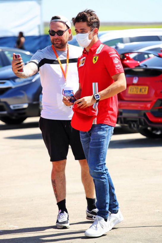 Charles Leclerc (MON) Ferrari with fan.
16.07.2021. Formula 1 World Championship, Rd 10, British Grand Prix, Silverstone, England, Practice Day.
- www.xpbimages.com, EMail: requests@xpbimages.com © Copyright: Davenport / XPB Images